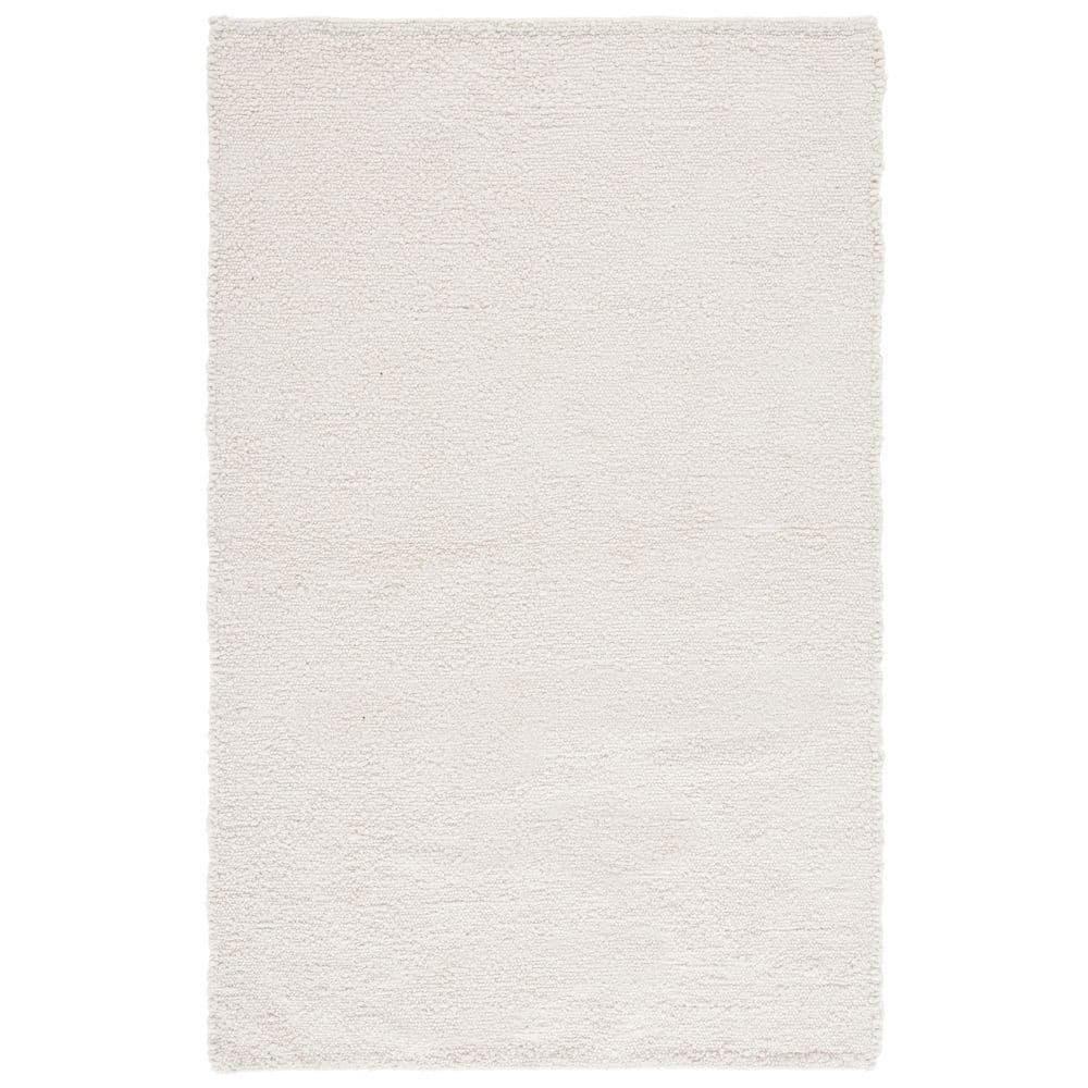 Renewal 5 ft. x 8 ft. Ivory Distressed Solid Area Rug