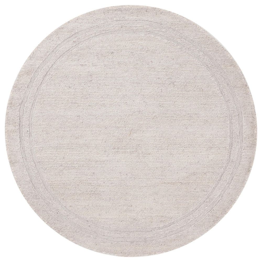 Renewal 6 ft. x 6 ft. Light Beige Solid Border Round Area Rug
